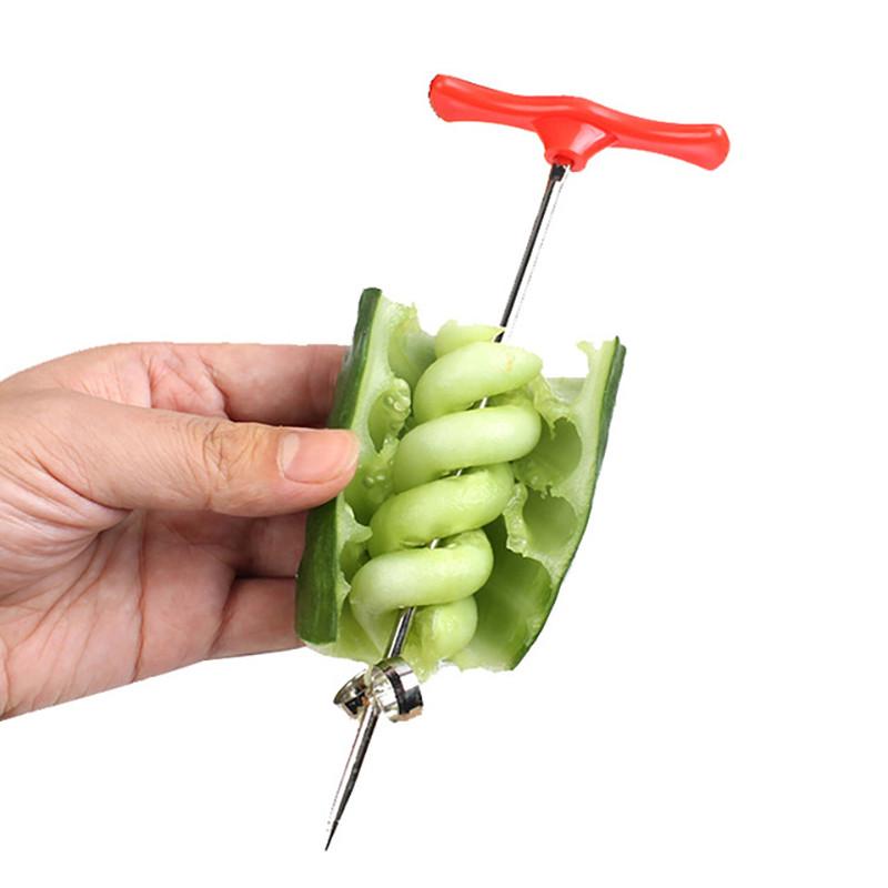A kitchen tool for spiralizing vegetables. Plastic + stainless steel