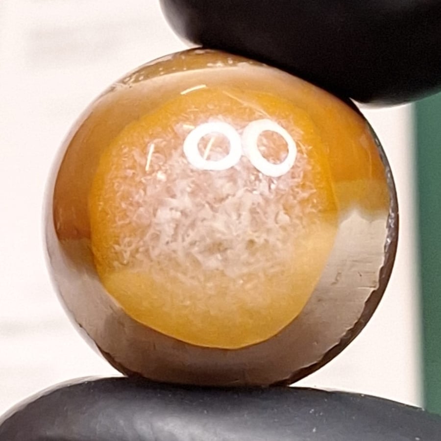 Natural agate stone documented tested with laboratory certificate closer to the Eye Authority