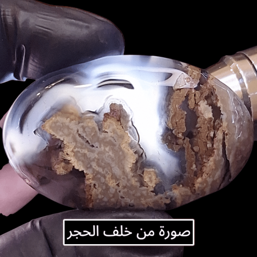 تحفة من حجر عقيق يتغير لونه تحت اضائة UV مع كشاف مجاني