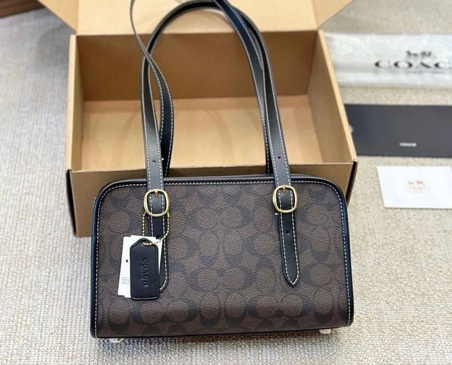 Coach Swing zip