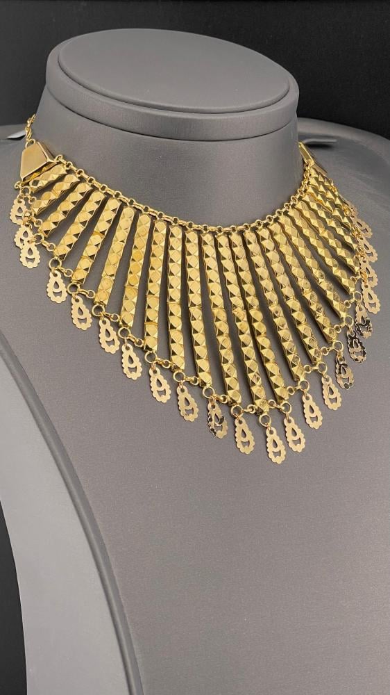 ارقي مزنط ذهب سعودي عيار 21 بتصميم فخم وزن 22.97 جرام