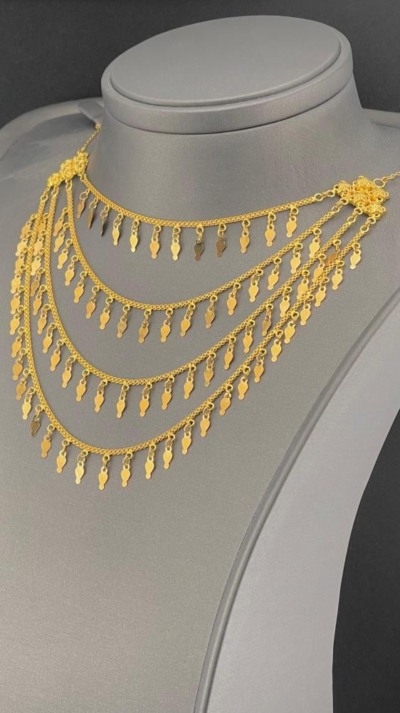 مزنط ذهب عيار 21 بتصميم ثلاث ادوار وزن 16.81 جرام