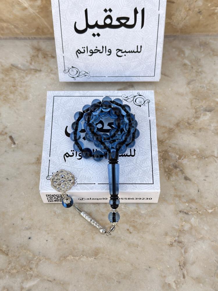 مسباح بكلايت سماوي خيط اسود شفاف