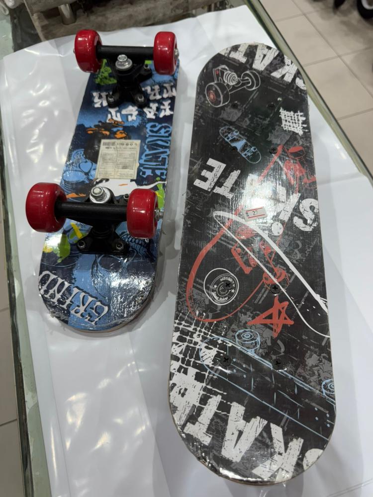 Skateboard (one piece only) length 44cm width 22cm