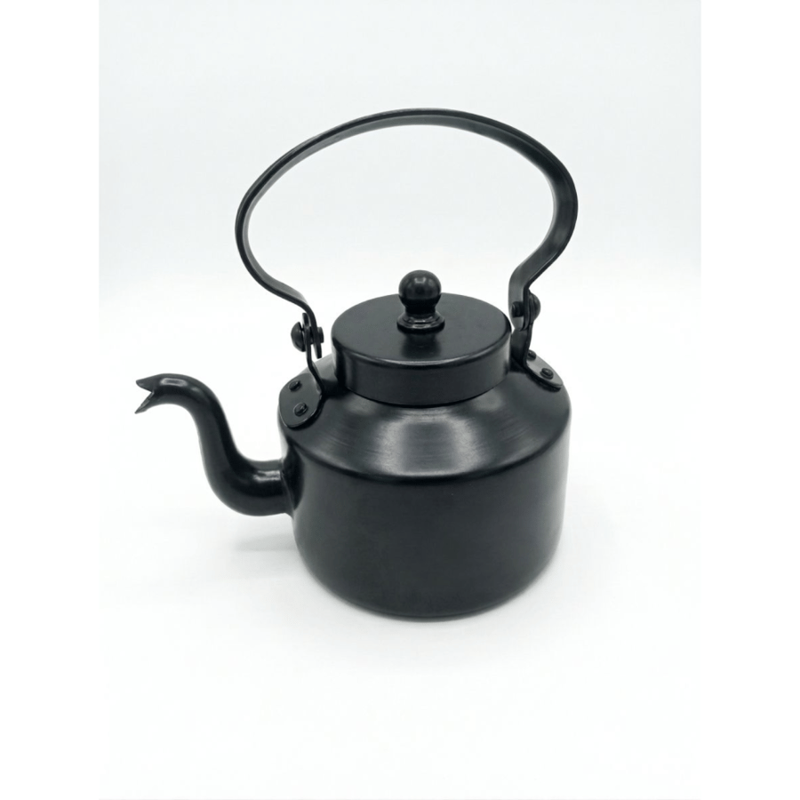 Black metal teapot, oven spray