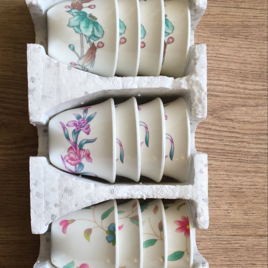 A dozen vintage melamine fans