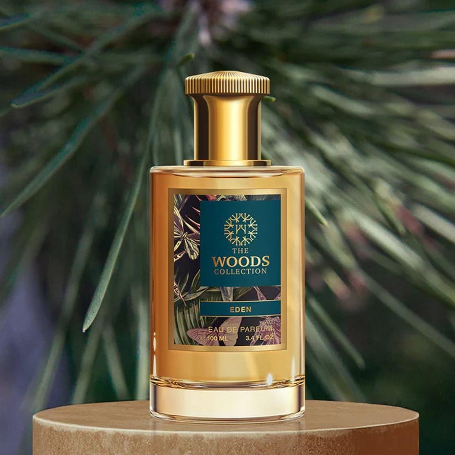 عطر او دو برفيوم إيدن من ذا وودز كوليكشن 100 مل ذهبي فواح