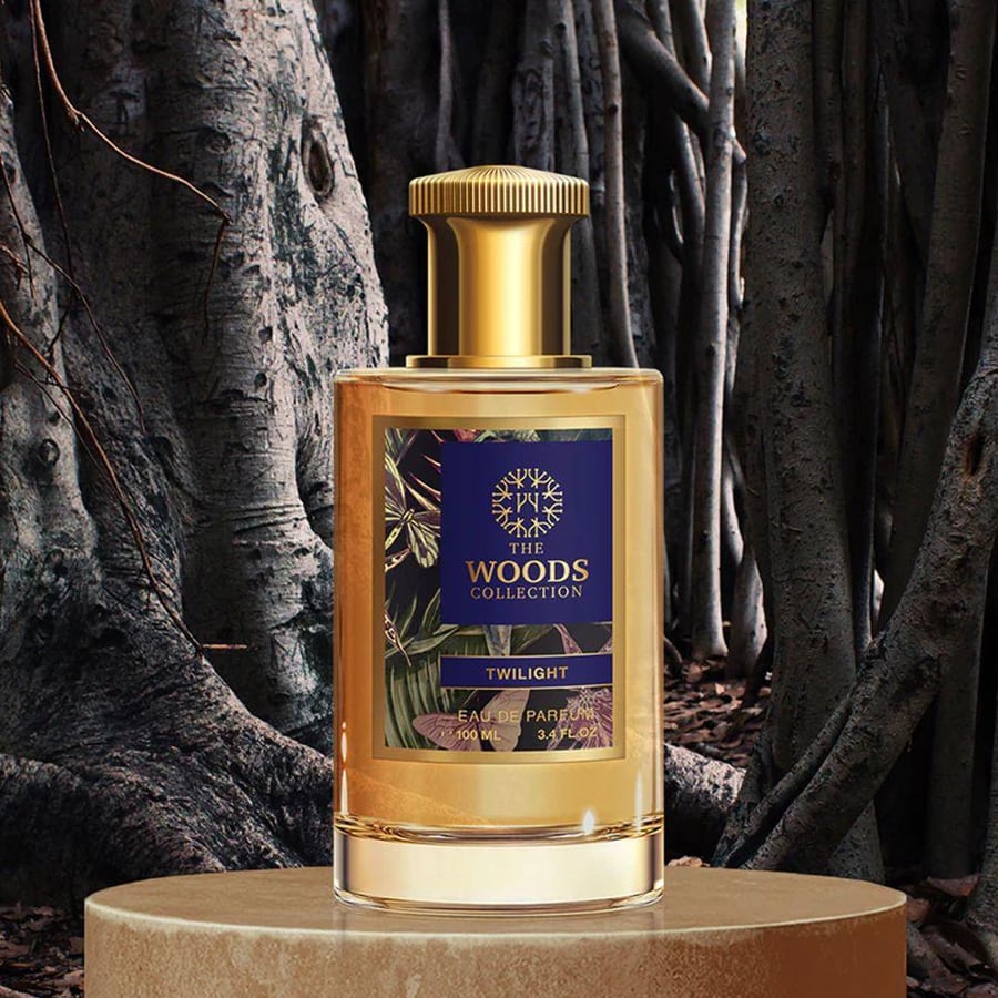 عطر توايلايت او دو برفيوم من ذا وودز كوليكشن زجاجة ذهبية 100 مل