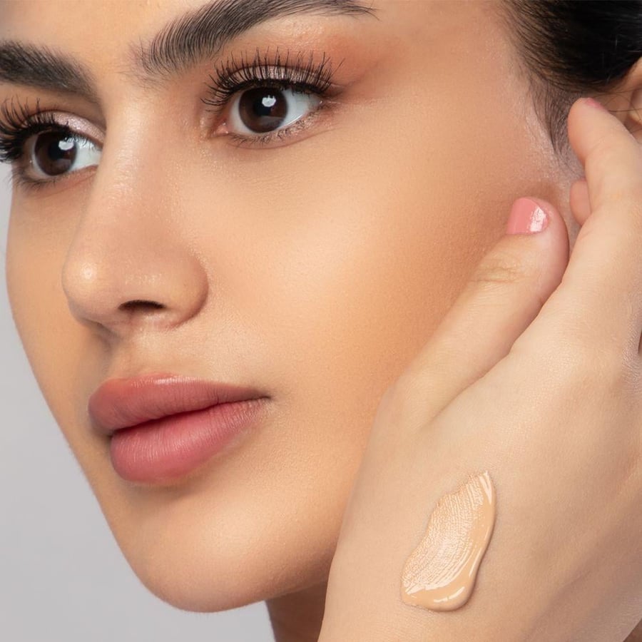كريم أساس مطفي Skin Wear من توب فيس - خالٍ من اللمعان