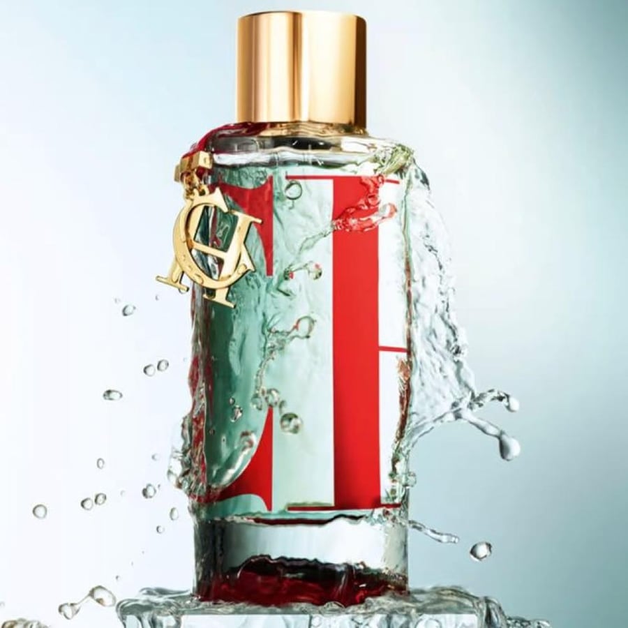 عطر أو دو تواليت نسائي توم فورد زجاجة زجاجية أحمر وذهبي مع تعليقة ذهبية