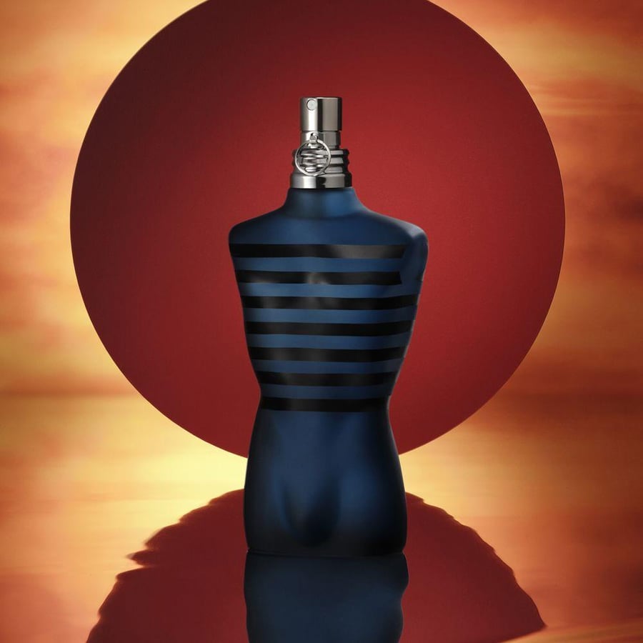 عطر رجالي طورسو Calvin Klein زجاجة زرقاء مخططة بغطاء فضي