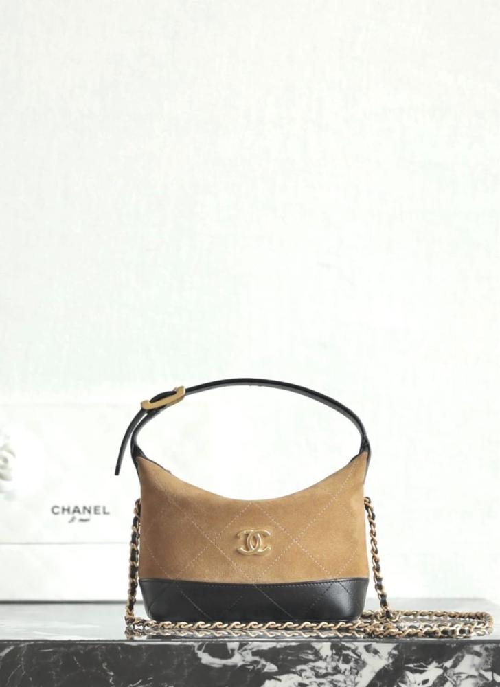 The Chanel Mini Coco Base Clutch with Chain