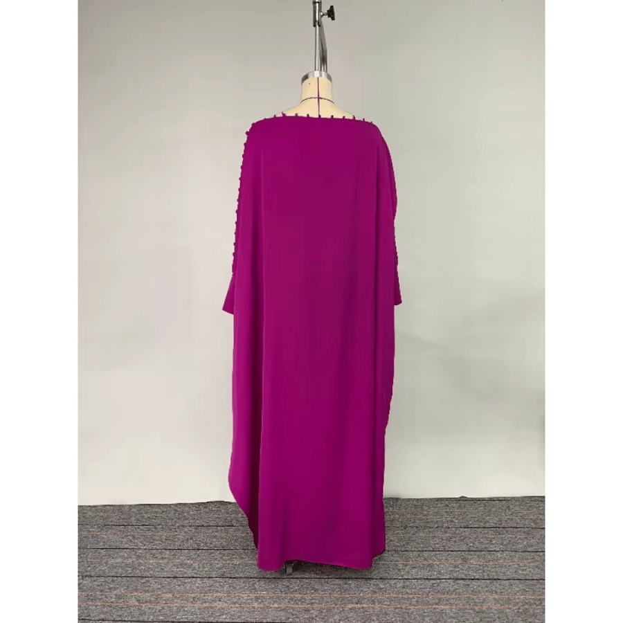 Loose maxi dress for women with batwing sleeves decorated with buttons