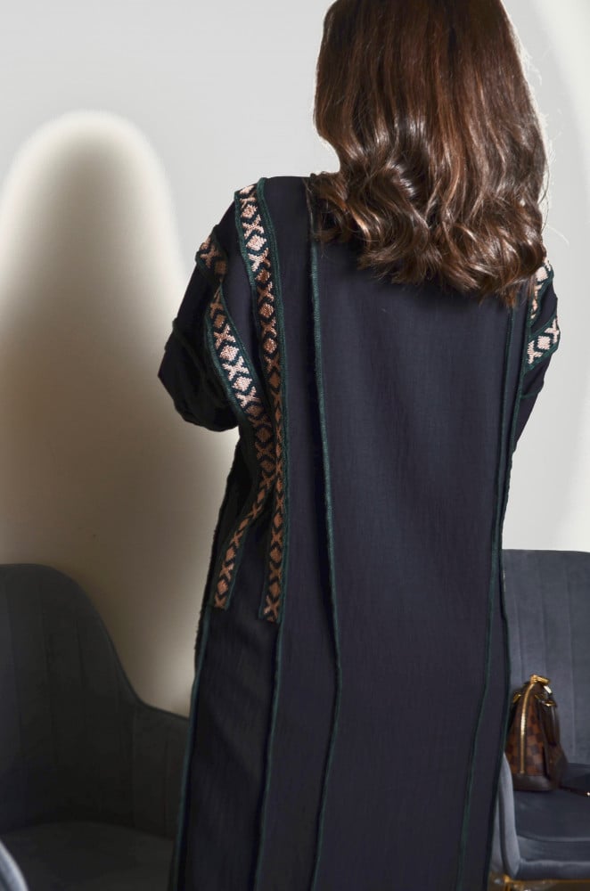 Royal crepe fabric abaya with a model in the front and back, and embroidery with green thread