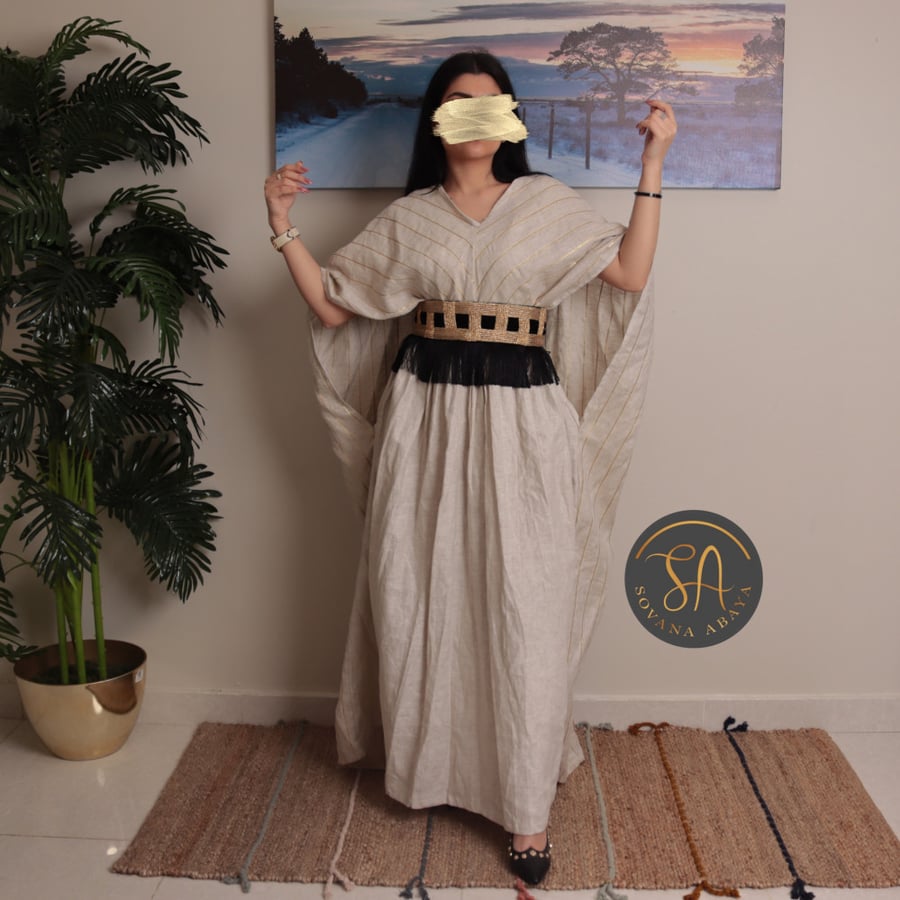 Be unique and eye-catching with the new limited edition collection of Sofana jalabiyas, made of a blend of luxurious fabrics. Elegant 3-piece jalabiya (dress - belt - jalabiya).