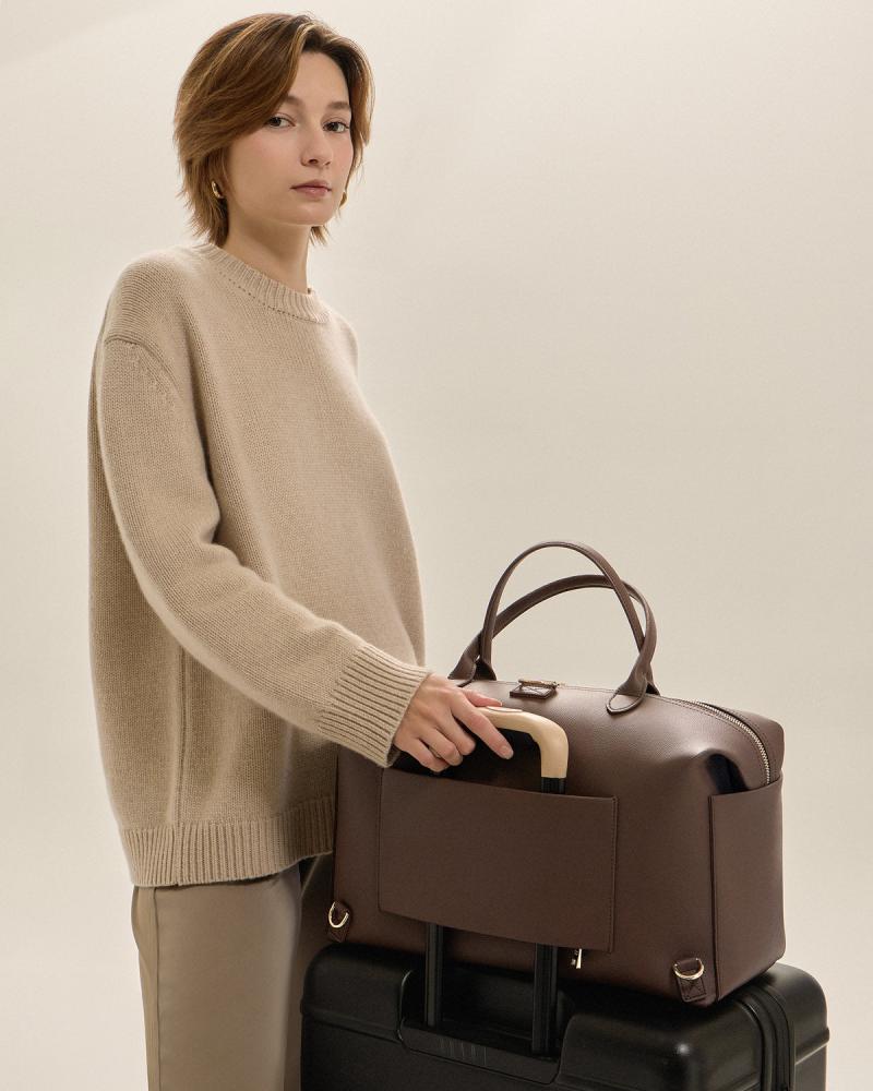 شنطة اطفال مينا باي كاريال/النوع جلد