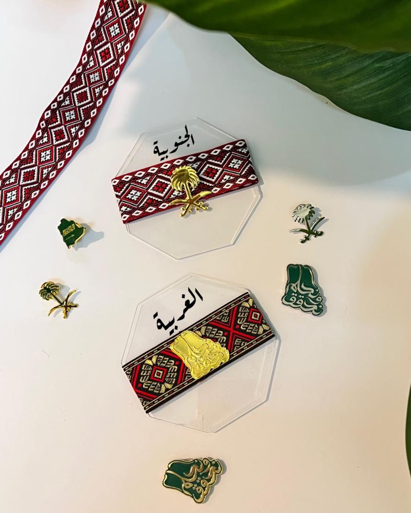 توزيعات بروش اليوم الوطني بعبارة