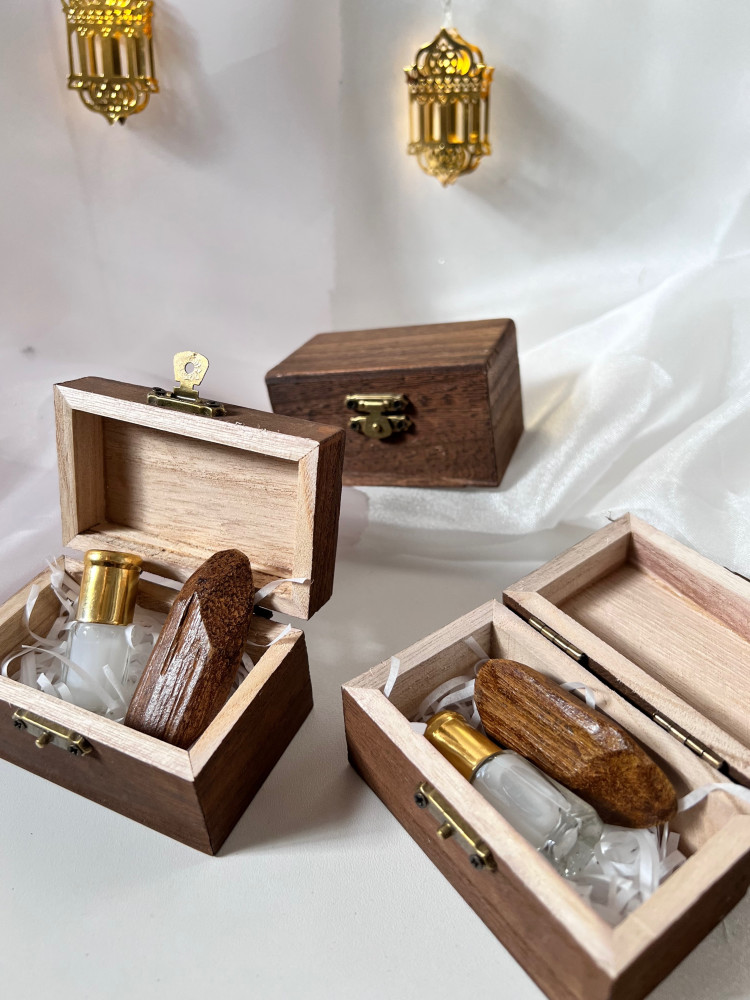 Wooden box with towel and broken stick