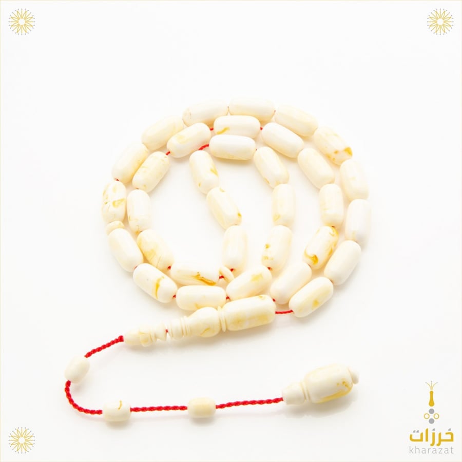 مستكة صنوبري ابيض مع اصفر شفاف