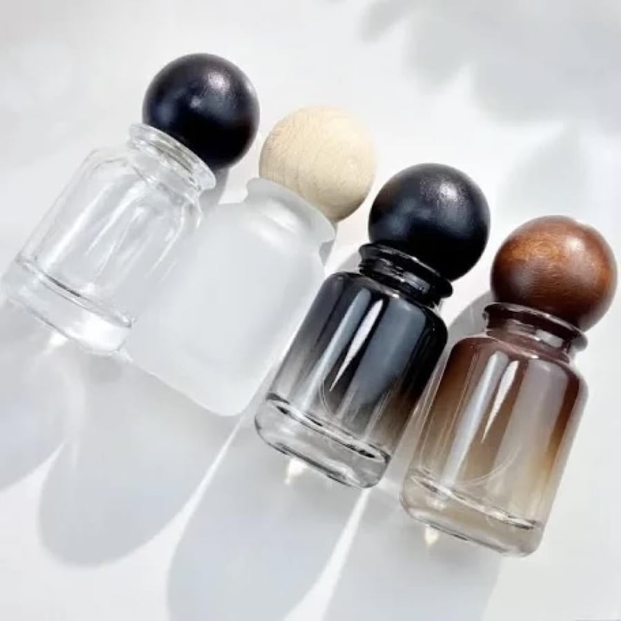 علبة عطر زجاجية 30 مل بنظام لف محكم لدى عاشق العودة