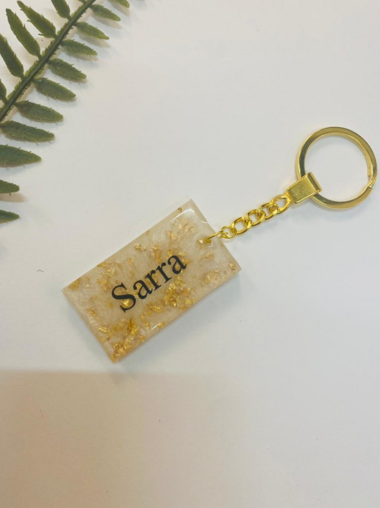 Keychain medal embroidered with gold leaf from luxurious resin