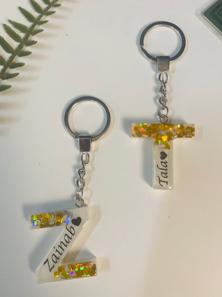Elegant keychain with letter and name made of luxurious resin