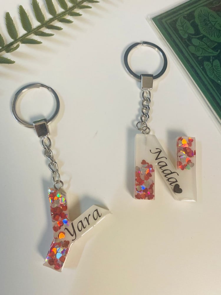 Elegant keychain with letter and name made of luxurious resin