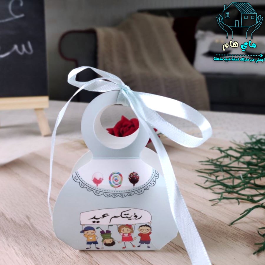 درزن علب هدايا ميني مصنوعه من الكرتون مع شريطه للتزيين والاغلاق وبتصميم العيد المميز، للجنسين