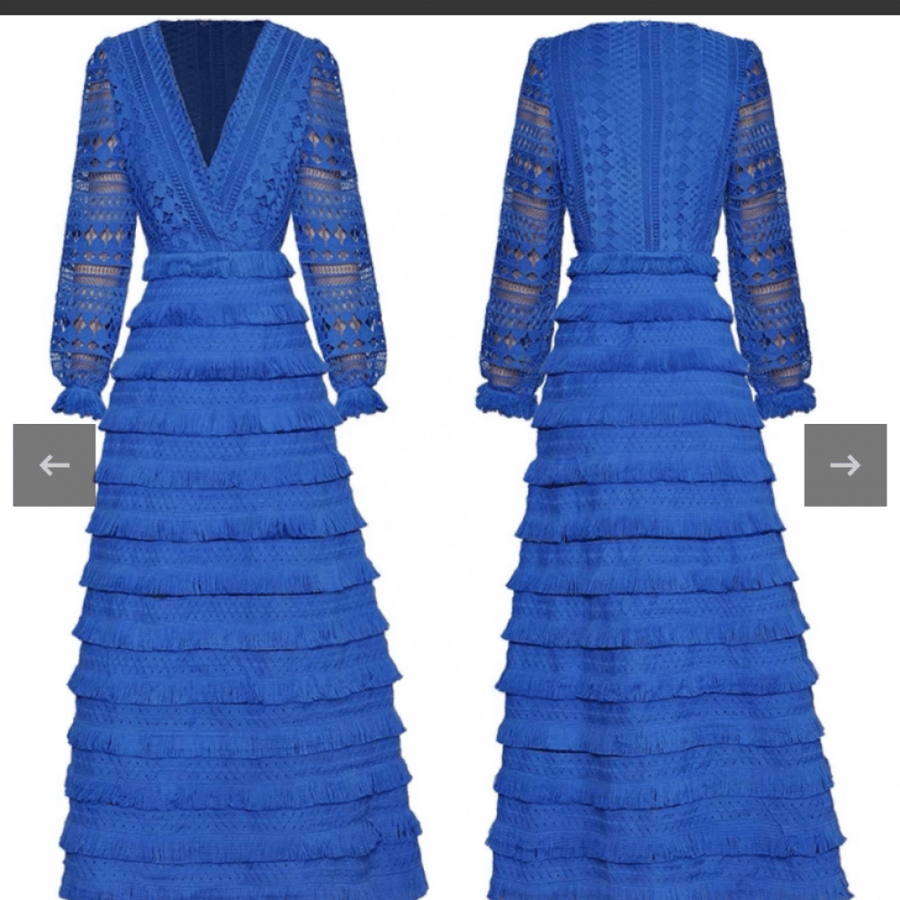 A navy dress decorated with beautiful fringe and lace