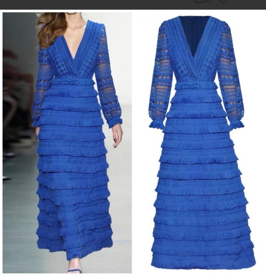 A navy dress decorated with beautiful fringe and lace