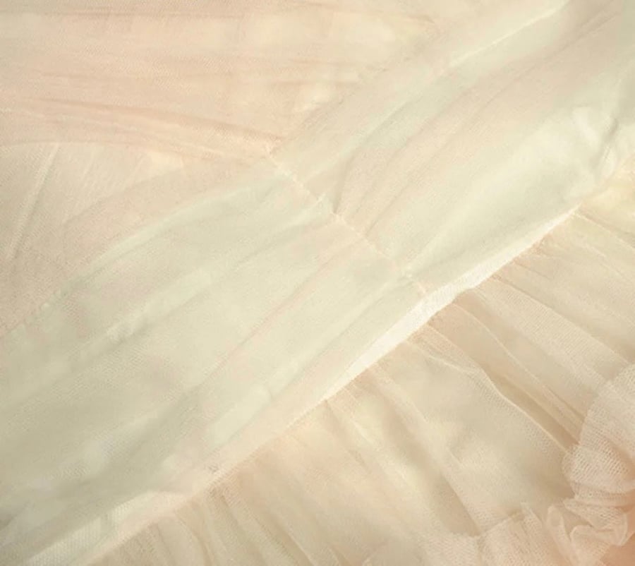 European dress decorated with tulle and wonderful chiffon with a draped design to highlight the beauty of the waist