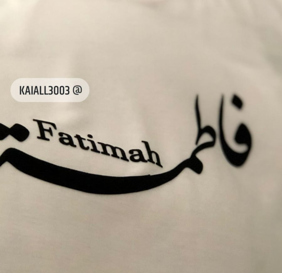 تشيرت كتابه بالشمواة لون أسود
