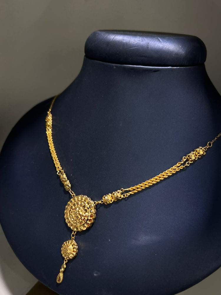 Pendant of the broken, door model, Jaber chair, 21-karat gold, gate 0.5