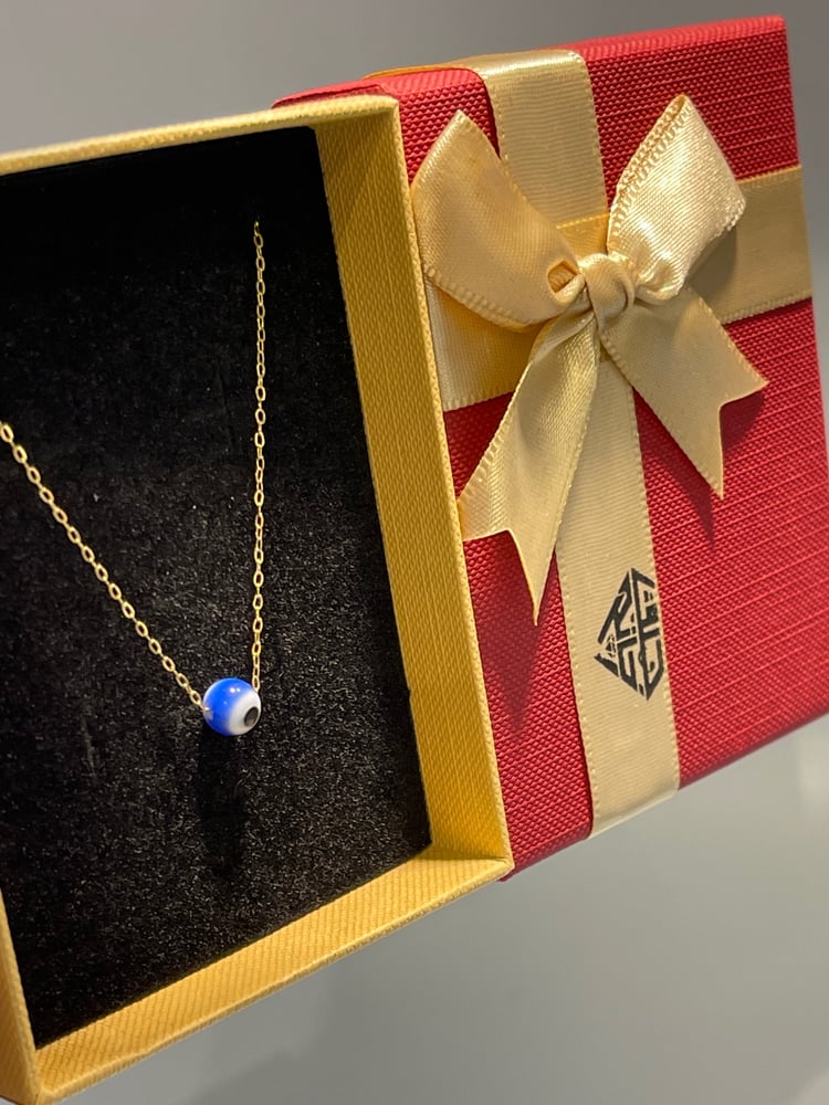 Thank you, the eye is distinguished and elegant, gold weight 0.60, 18 karat