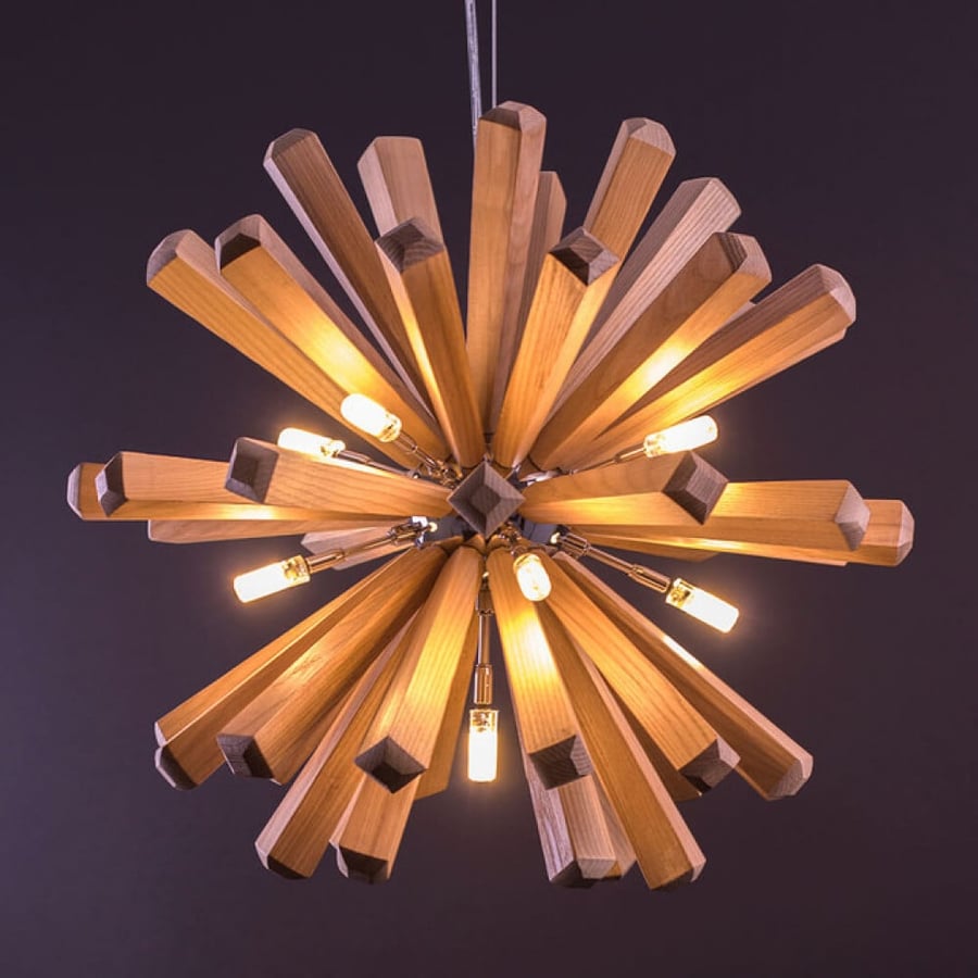 Single circle wooden chandelier with yellow lighting