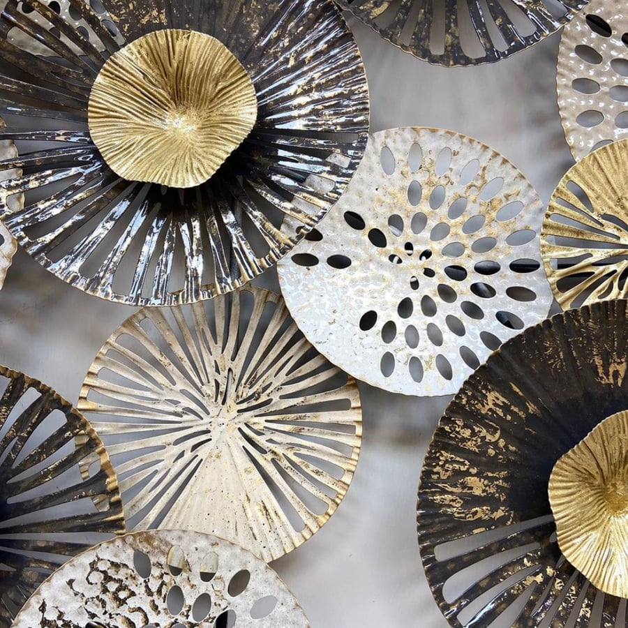 Large wall-mounted iron panel with hollow circles