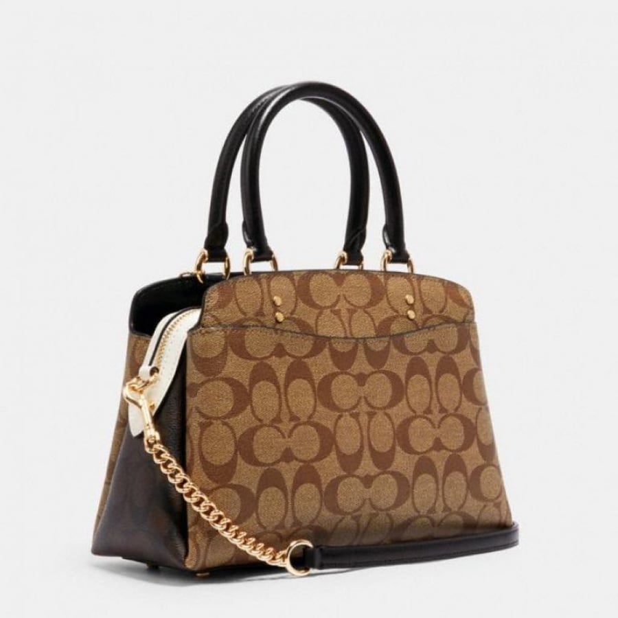حقيبة "ليلي كاريال Lillie Carryall" بتصميم صغير مزين بنقشة ماركة كوتش و مزودة بحزام سلسلة