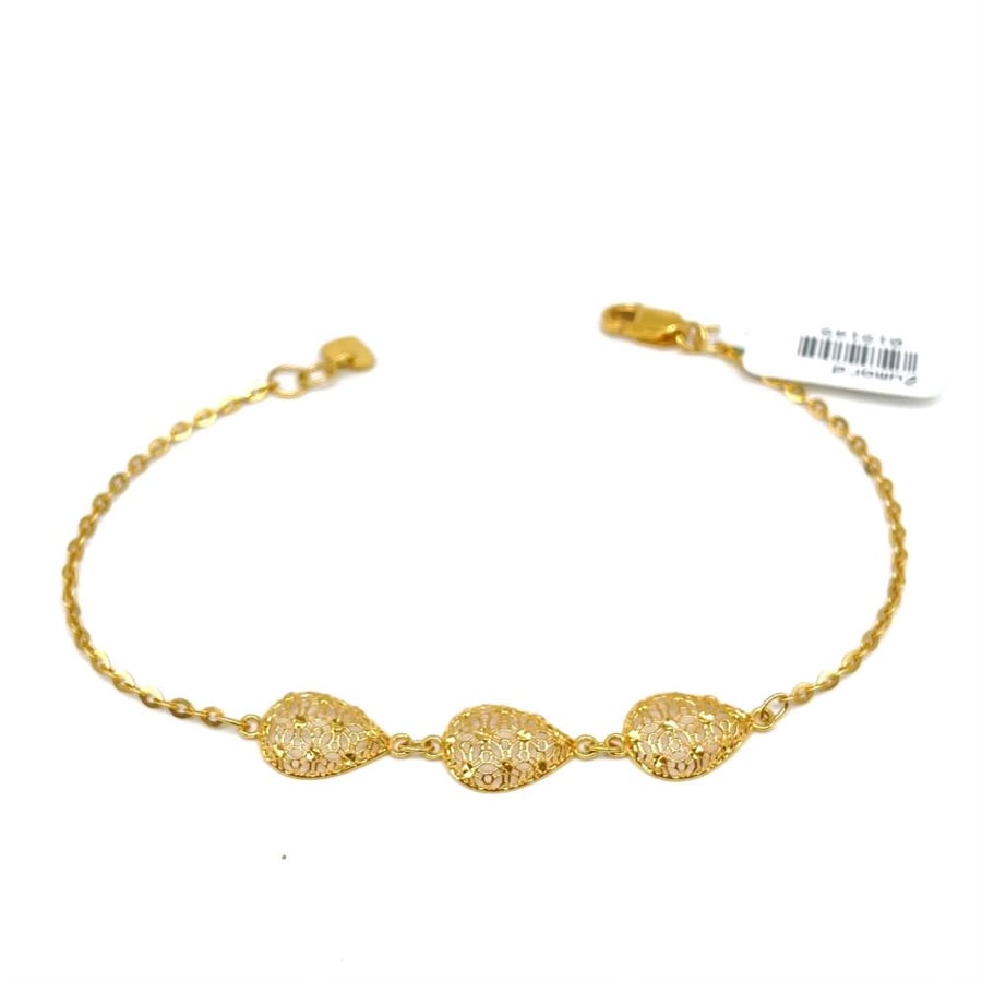 21 karat gold flow, weight 3.41 grams