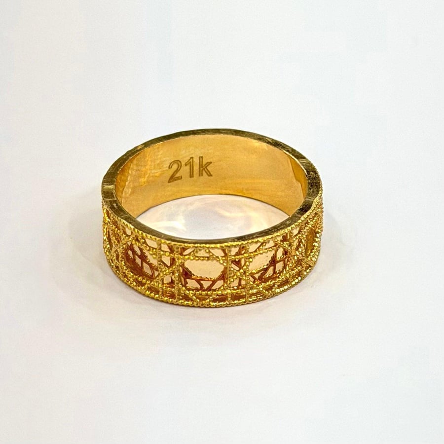 A Dior pure gold ring, 21 karat | weight 2.34 grams | size 16 | R075