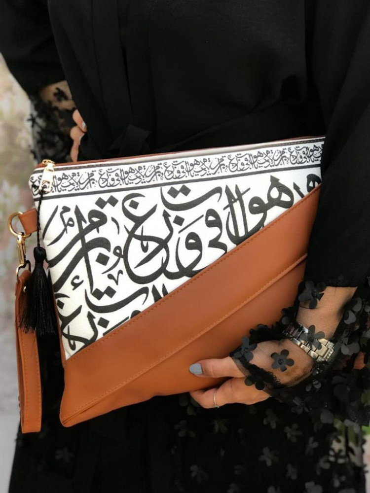 أفضل شنطة يد باوتش جلد مزخرفة بني جملي للطباعة
