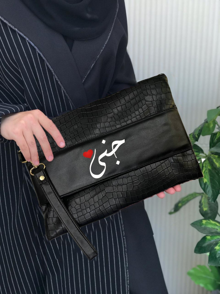 شنطة يد باوتش جلد محبب أسود سادة من متجر الشرق النادر