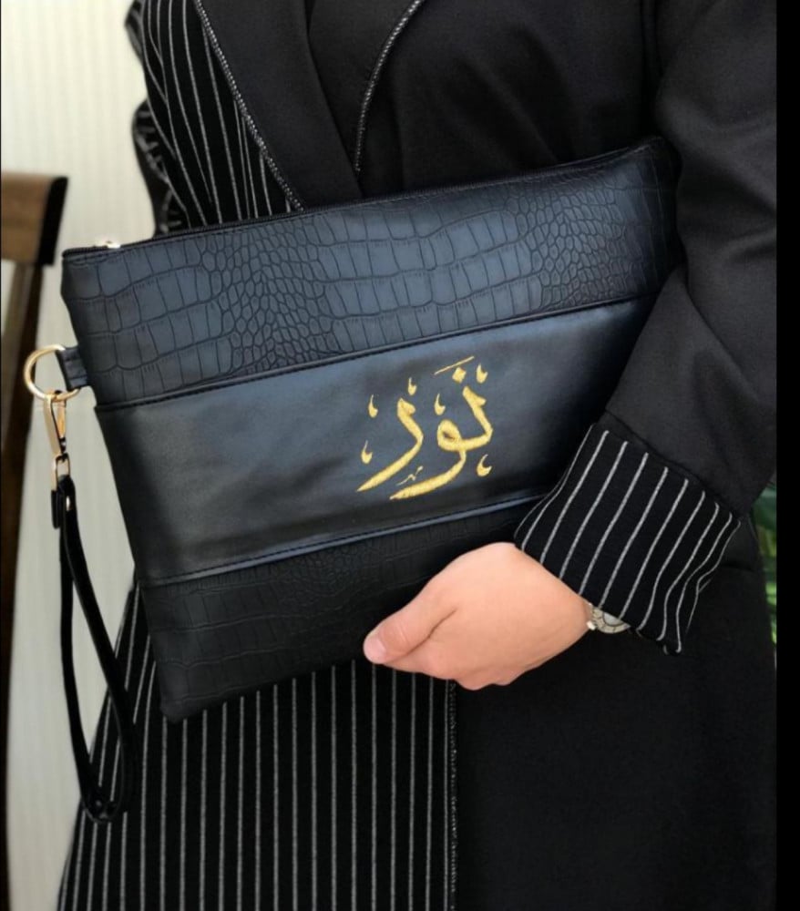 أفضل شنطة يد باوتش جلد محبب أسود لطباعة متجر الشرق النادر
