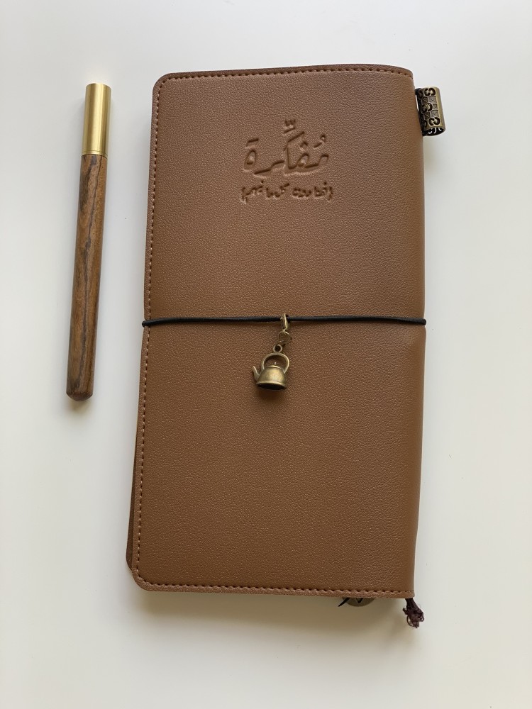ميدالية بشكل ابريق