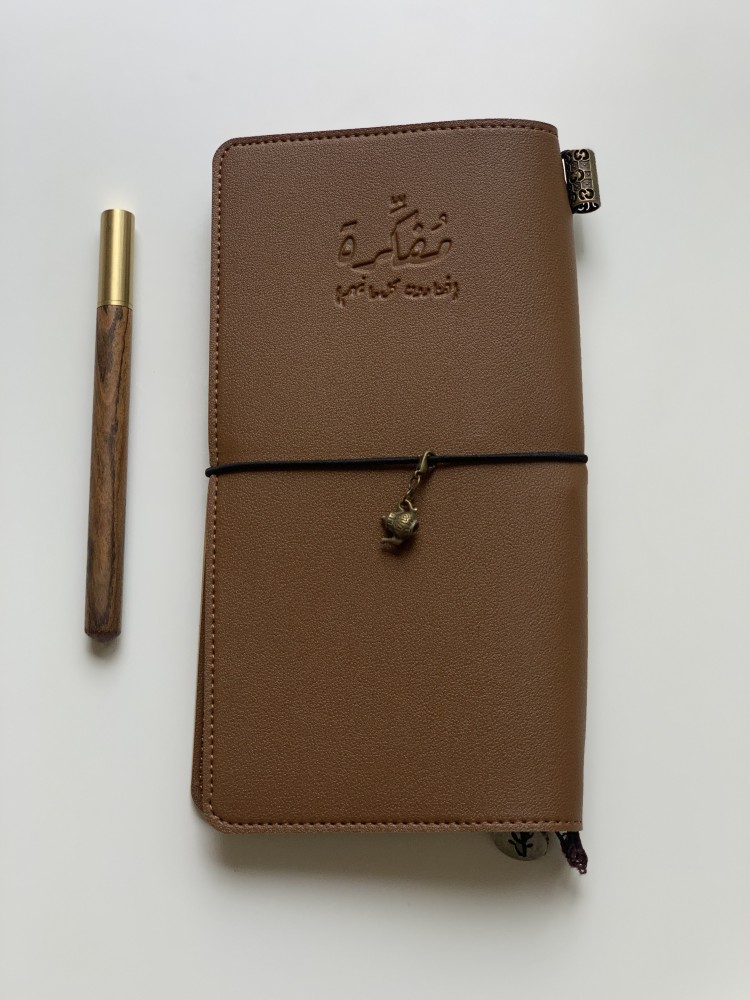 ميدالية بشكل إبريق