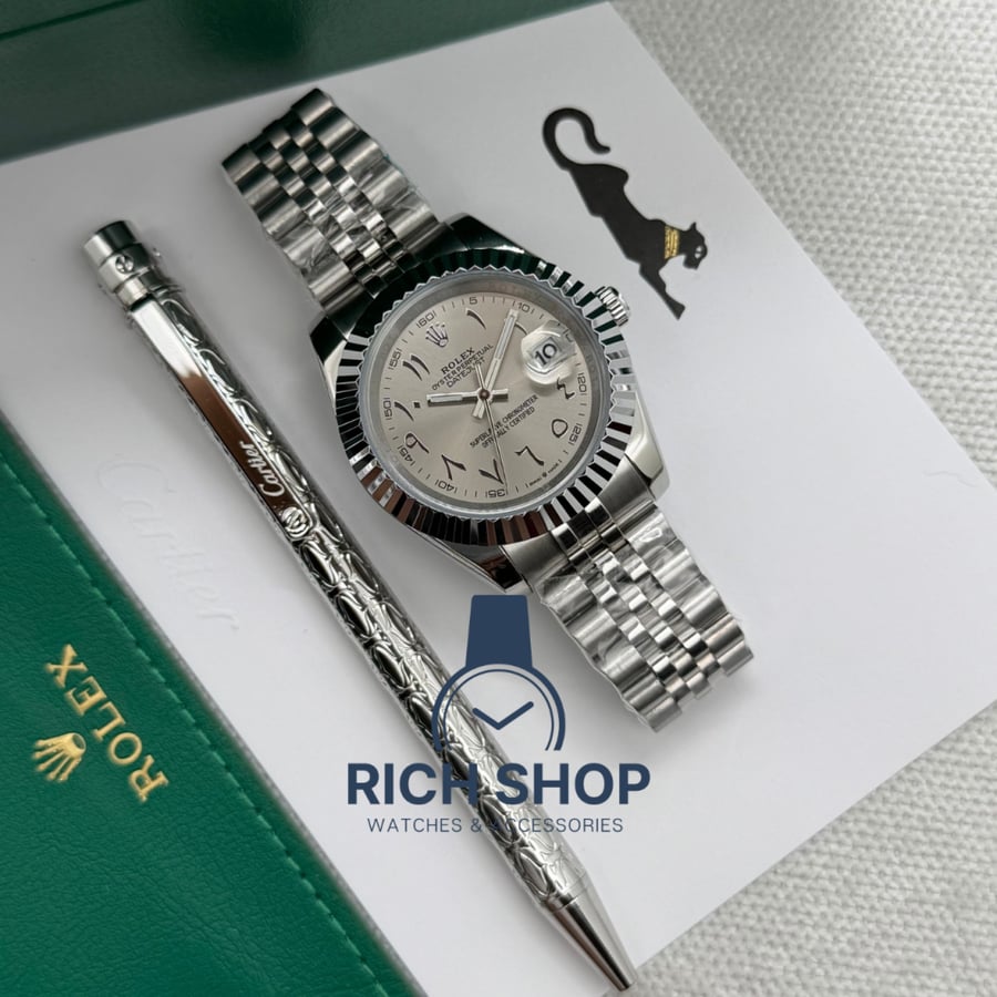 Rolex watch set with Cartier pen