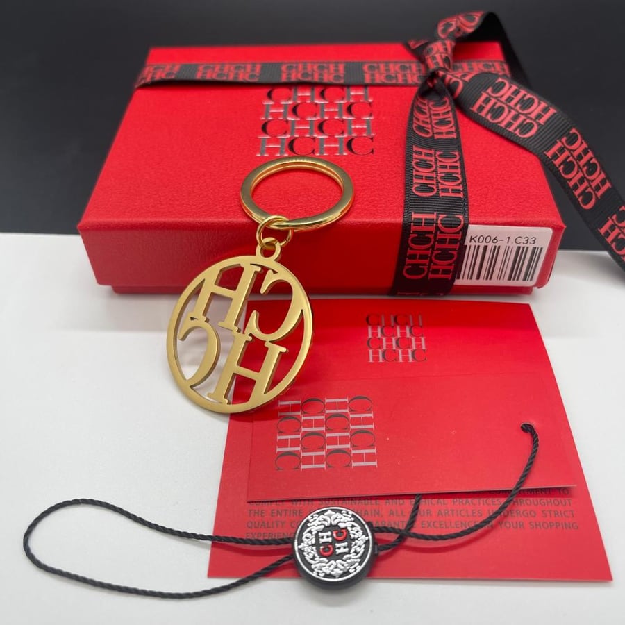 Carolina Herrera CH medal