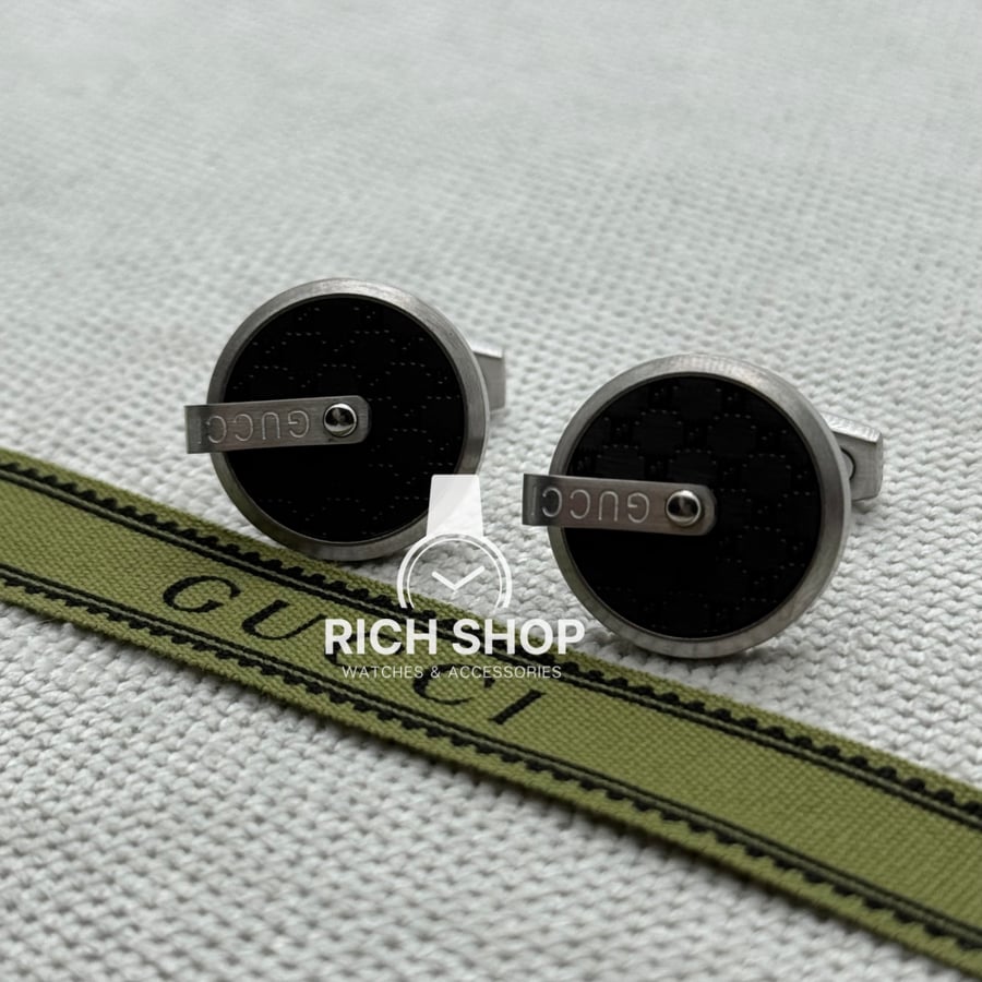 Silver Gucci cap on black
