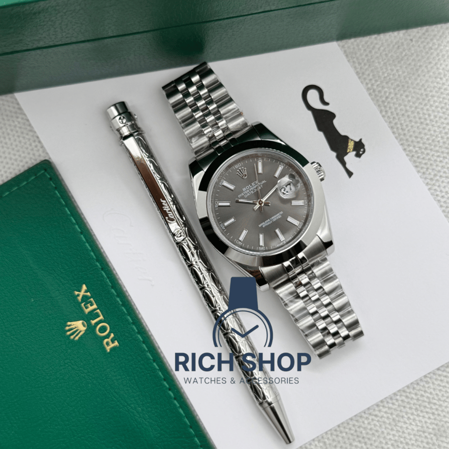 Rolex watch set with Cartier pen