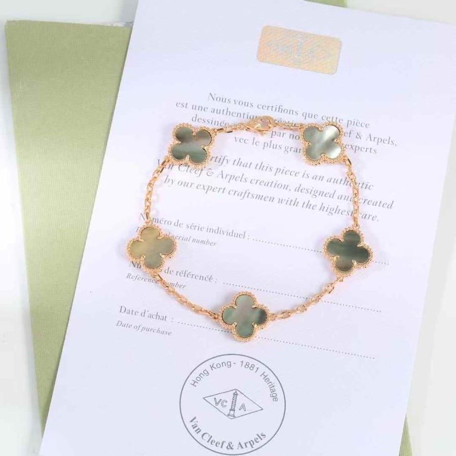 Van Cleef bracelet with 5 mother-of-pearl flowers
