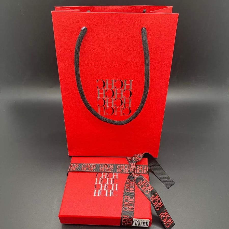 Carolina Herrera black medal